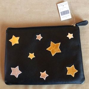 NWT Barney’s black pouch with silver & gold stars